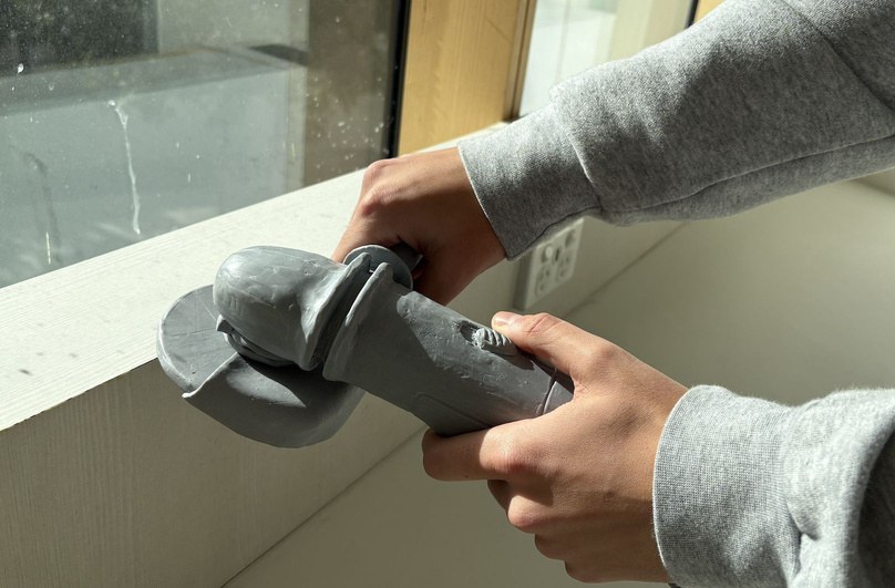 Angle grinder prototype in hand